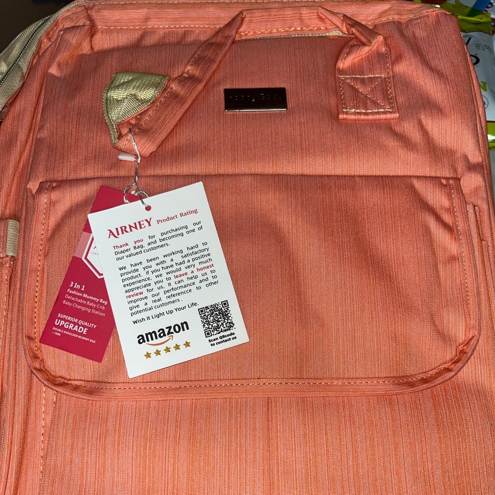 Diaper bag with changing table